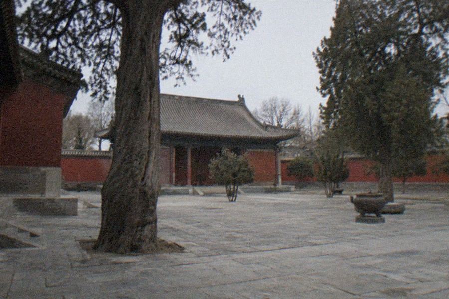 Interior gallery of the Beijing Ancient Architecture Museum with architectural scale models and timber structure displays inside a Ming-era altar hall