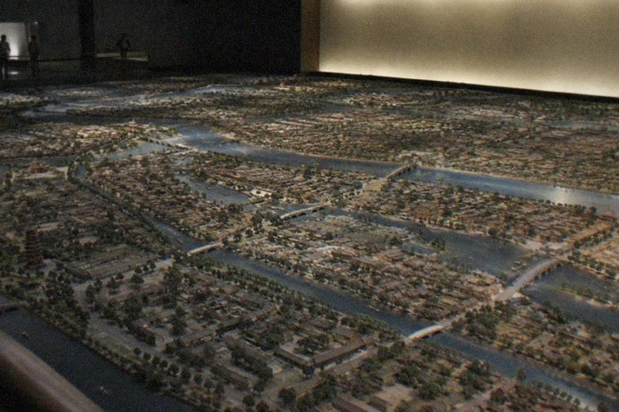 Spacious museum gallery hall with a large model boat and exhibition displays under high ceilings
