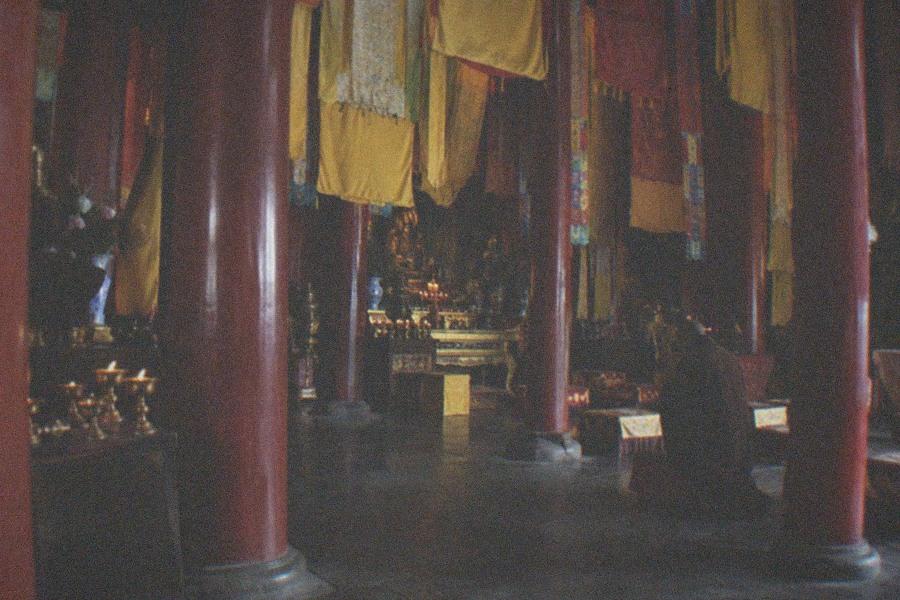 Courtyard of a Qing dynasty princely mansion with grey tiled roofs and red lanterns