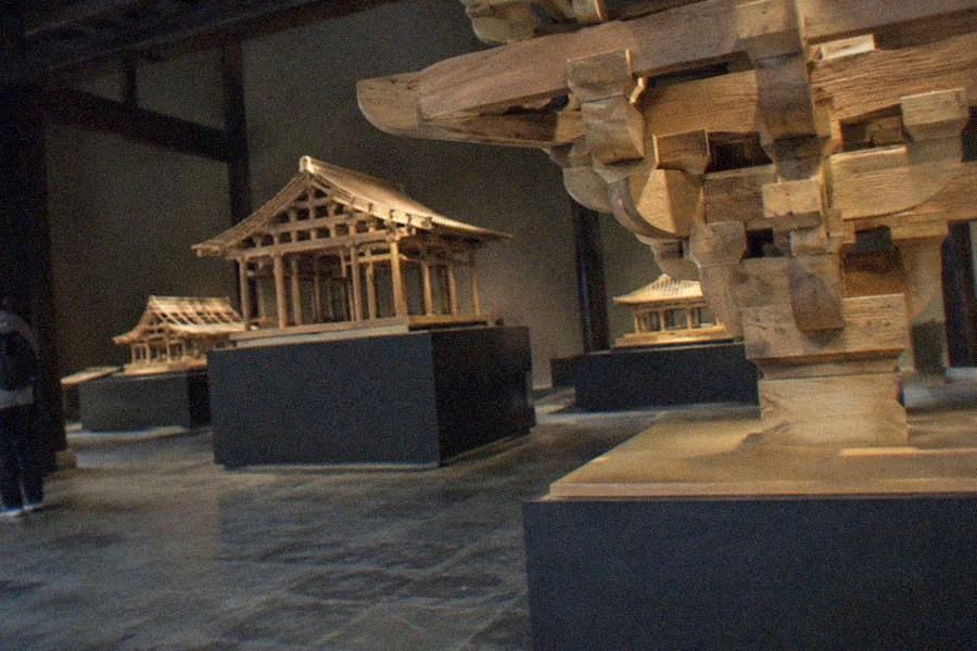 Carved stone viewing platform beside an open ritual field inside a walled Beijing complex