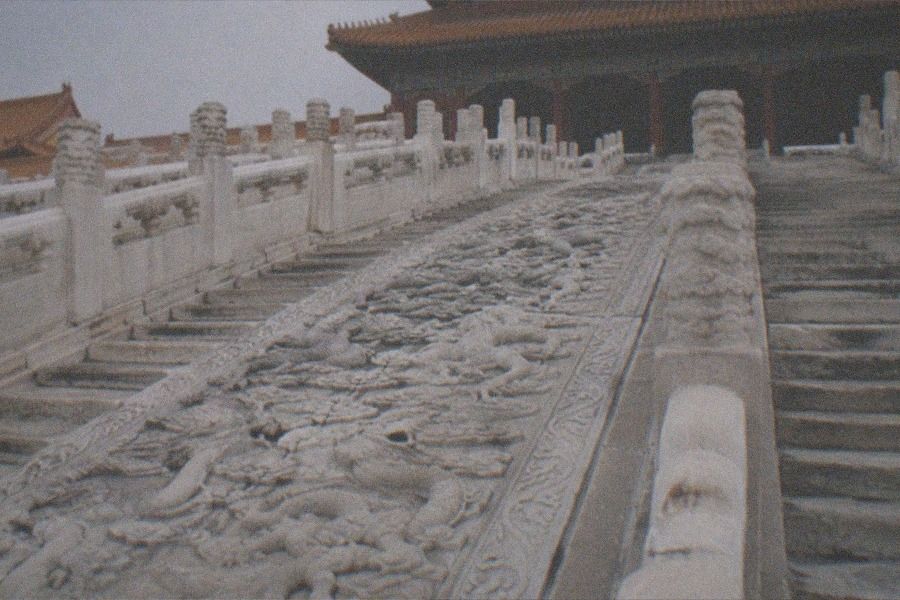 The Hall of Supreme Harmony in the Palace Museum (Forbidden City), its golden roof rising above the marble triple terrace on a clear day